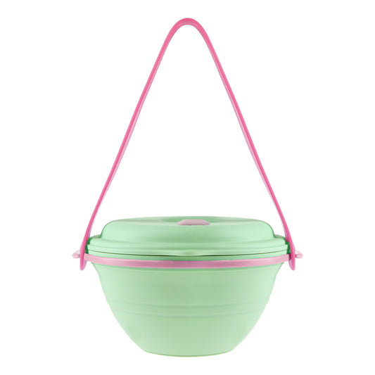 Special edition, green pink lunch box uncollapsed with the strap hooked onto it, front view.